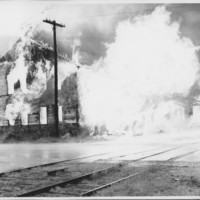 Removal of the B. and M. Freight House by Burning and as a Fire Fighter&#039;s Training Exercise. 7/12/1975. Explosion on West Side.