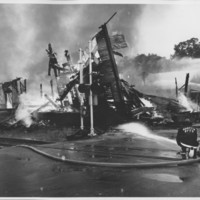 Removal of the B. and M. Freight House by Burning and as a Fire Fighter&#039;s Training Exercise. 7/12/1975. Final Collapse.