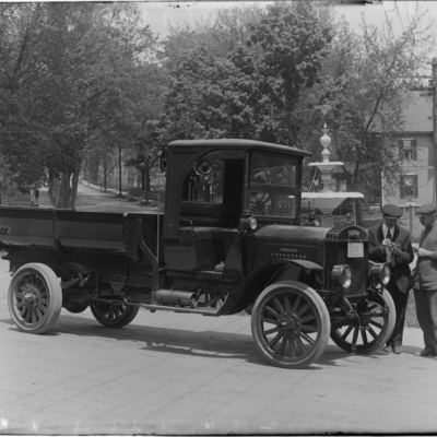 Portrait of Two Men and Indiana Dump Truck Bellows Falls, Vermont